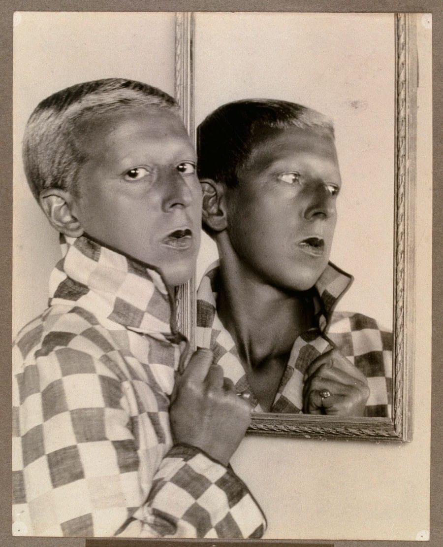 Claude Cahun, autoportrait au miroir, veste à damier, 1928