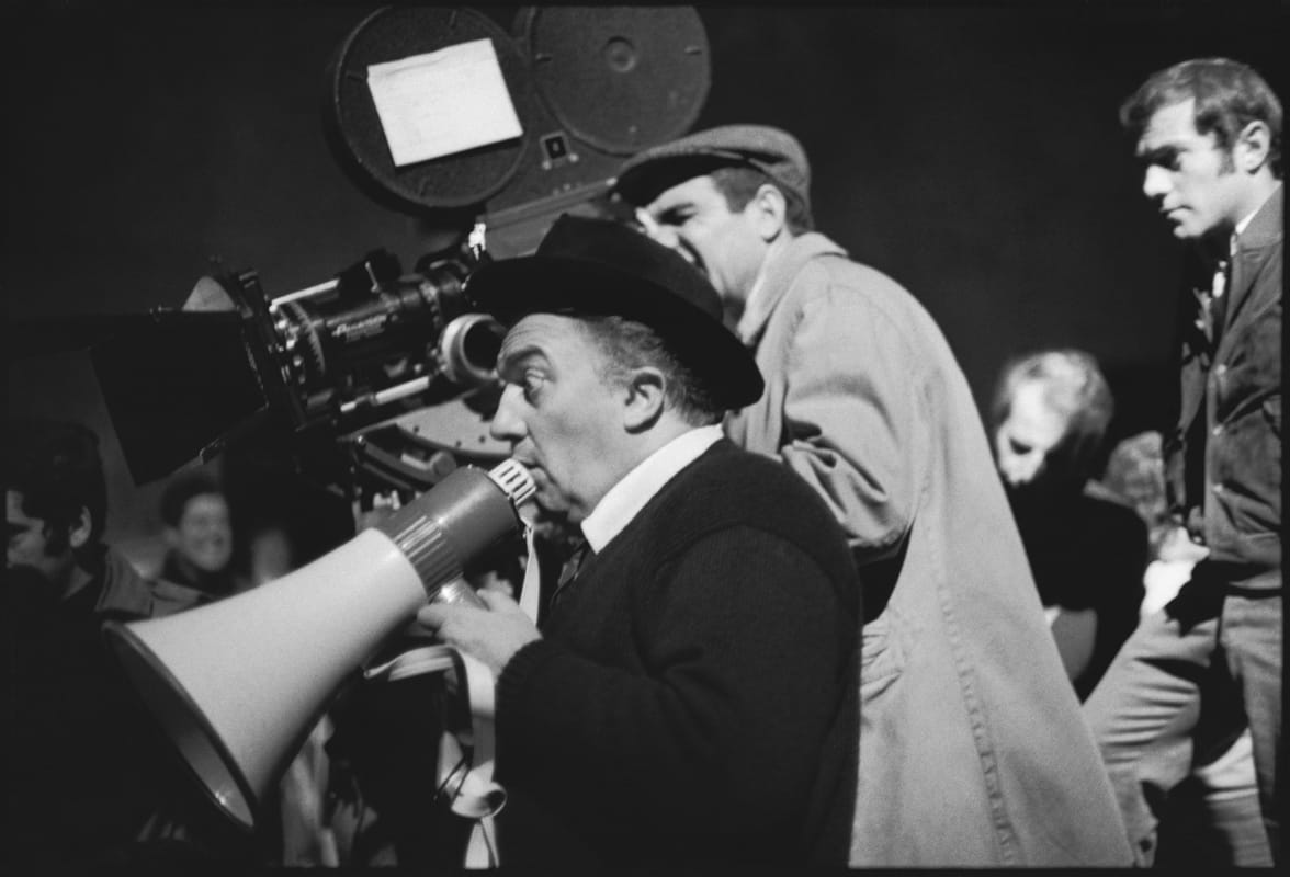Mary Ellen Mark, Federico Fellini gives direction during a take. The film follows the exploits of Encolpio and his friend, Ascilto Satyricon, Rome, Italy 1969