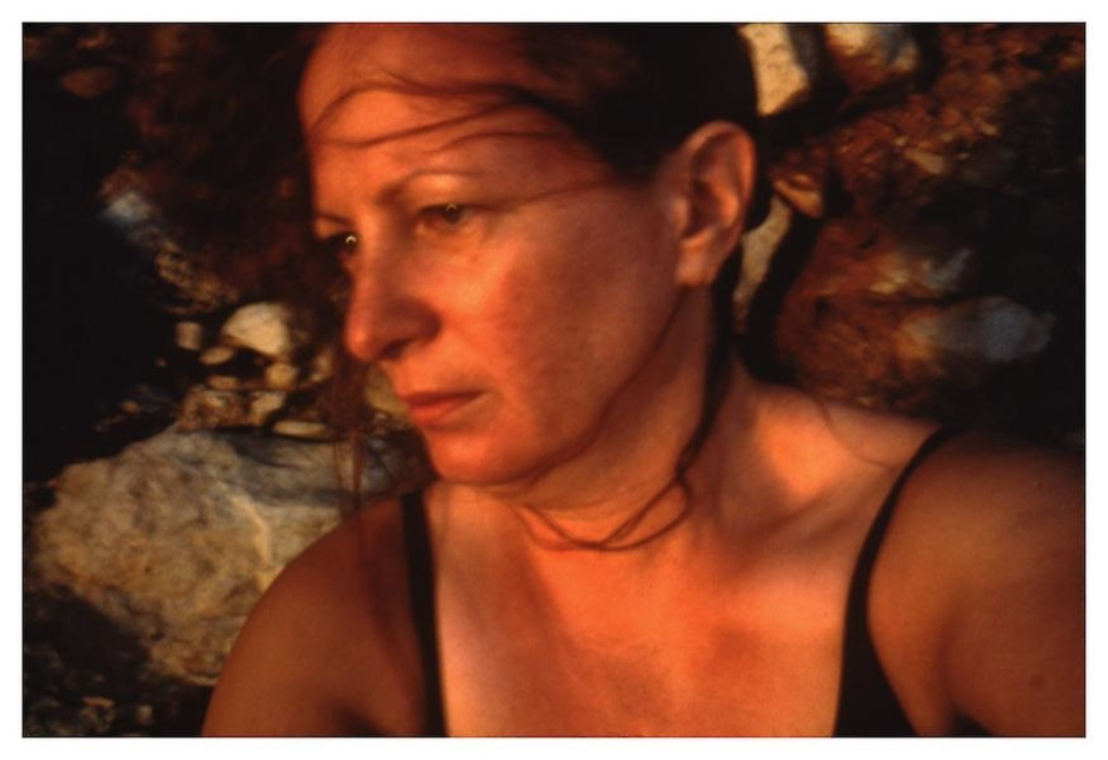 Nan Goldin, Self-portrait on the rocks, Levanzo, Sicile, 1999