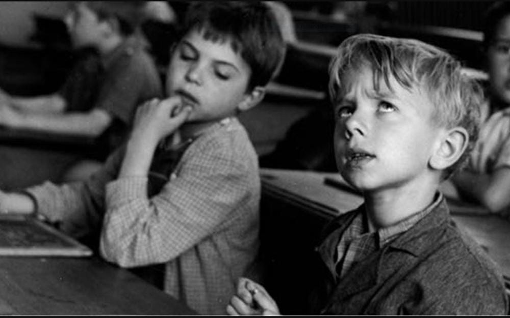 Deux ecoliers pendant un cours, Robert Doisneau