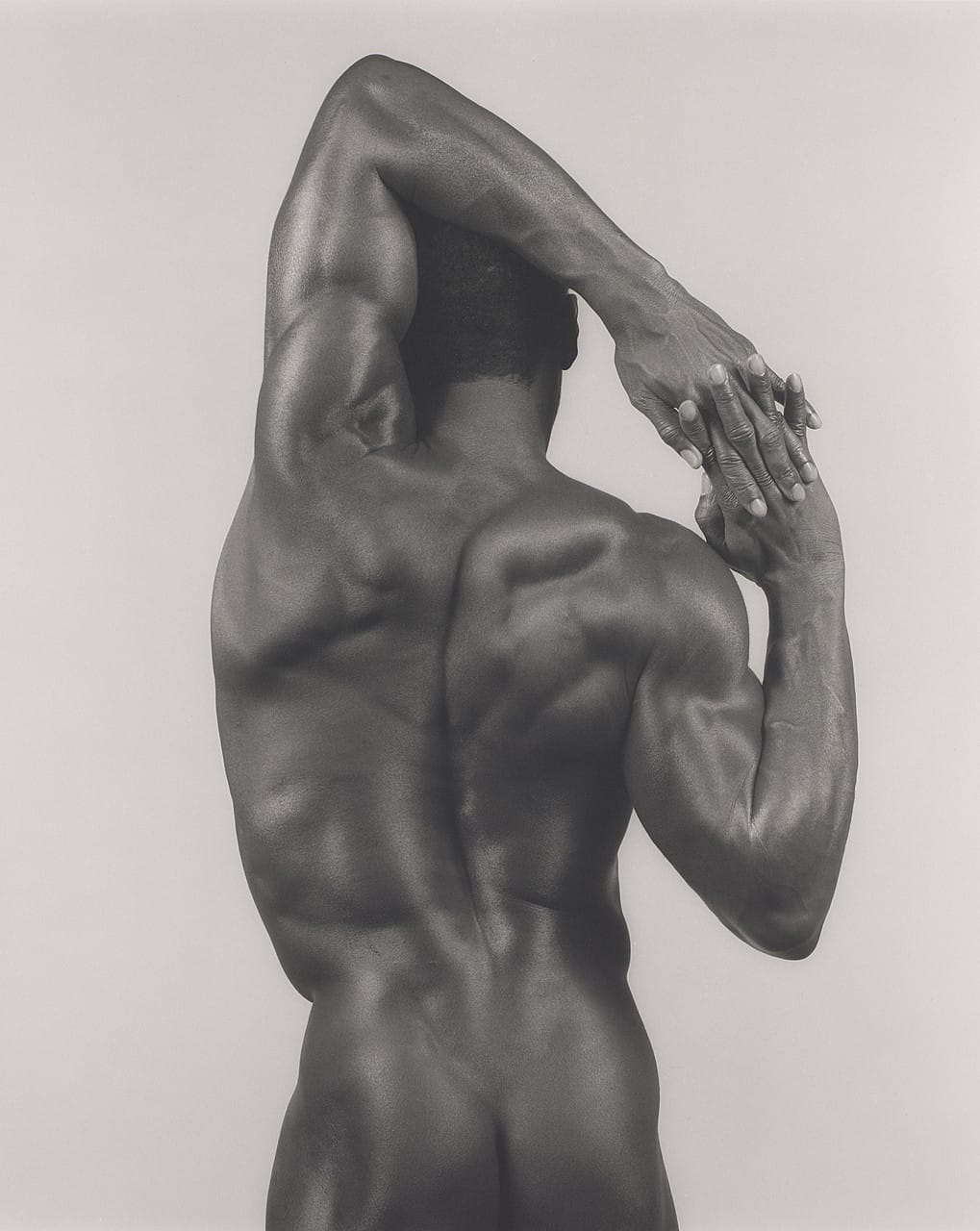 Derrick Cross, 1983. Un dos cadré comme un torse antique : la sculpture, encore.