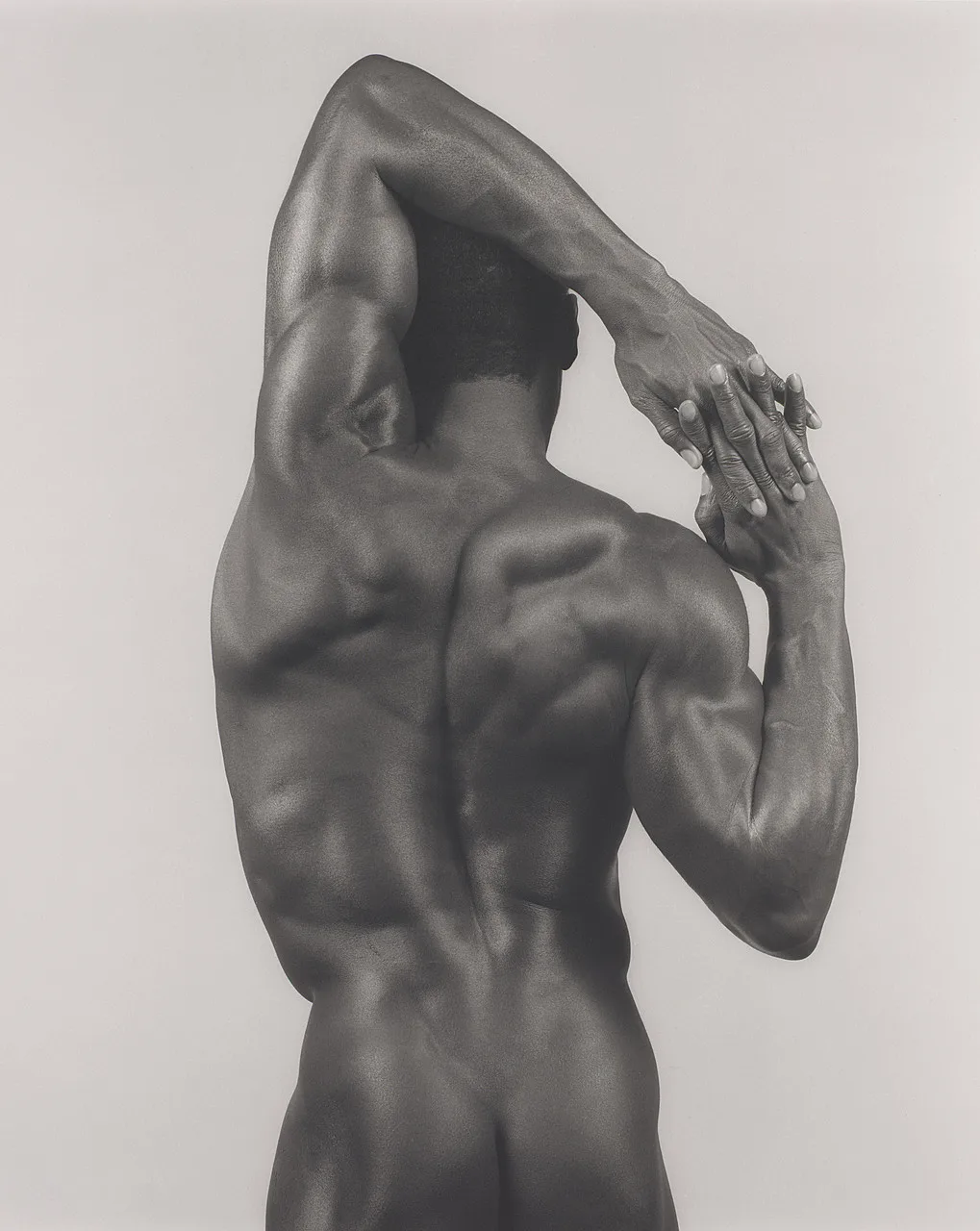 Derrick Cross, 1983. Un dos cadré comme un torse antique : la sculpture, encore.